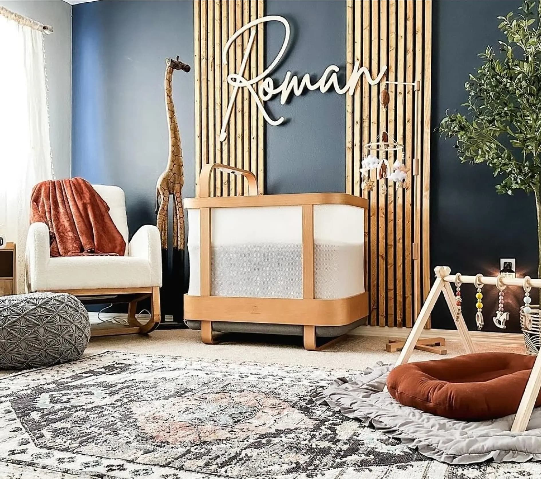 Bright nursery styled around the Cradlewise crib