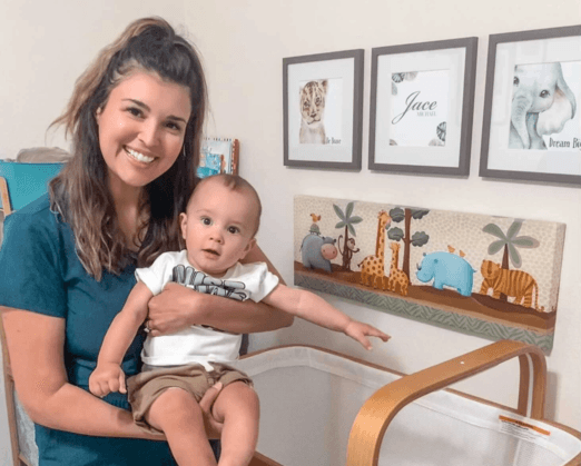 Tina, RN and their baby with a Cradlewise smart crib